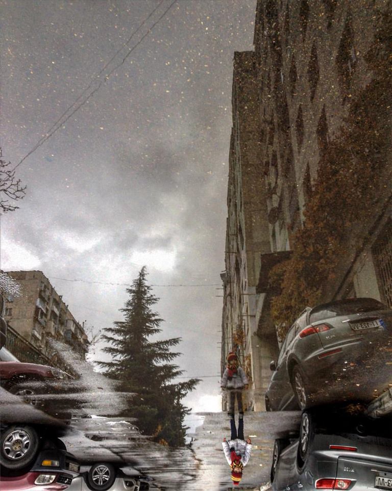 Exclusive: Georgian photographer captures the “other side” of the world in puddles geotv.ge